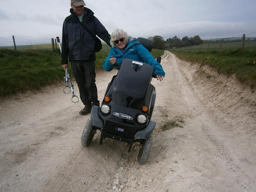 Invalid carriage trying to negotiate ruts. Invalid carriage trying to negotiate ruts.